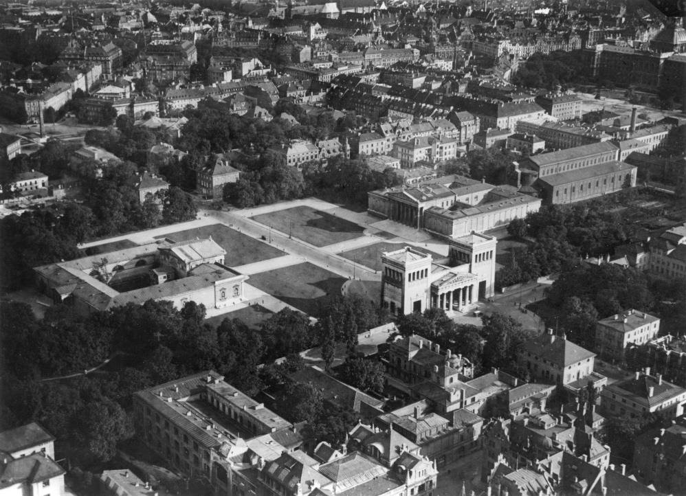 A black-and-white photo looking across the Maxvorstadt district toward the Old City. Königsplatz, with the Propylea, the Glyptothek, and the Antikensammlungen can be clearly seen.  
